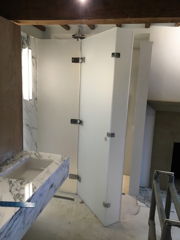 Bespoke frosted glass shower enclosure in Nine Elms luxury bathroom